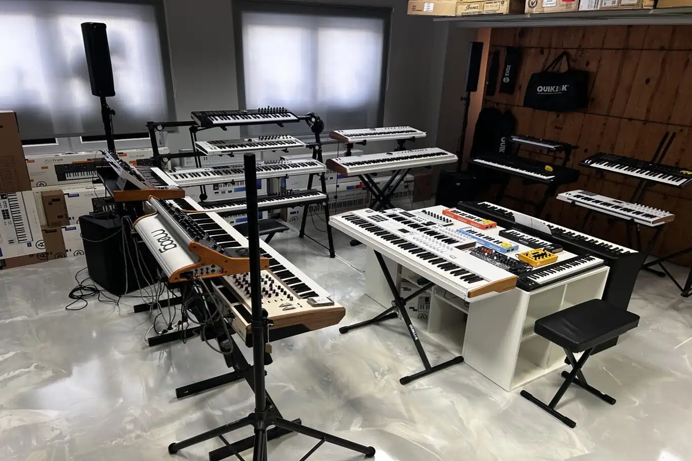 Inside the BAM Guitar Center store in Celje, pianos